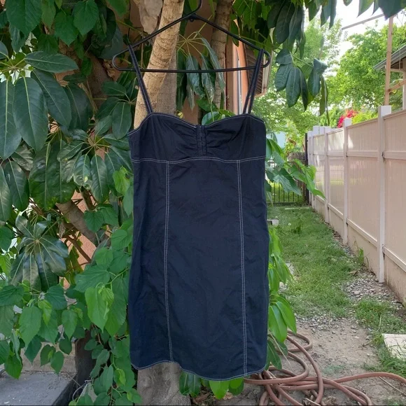 Black dress with white stitching. - Picture 1 of 5